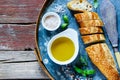 Baguette, Olive oil and basil Royalty Free Stock Photo