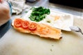 Baguette with salmon in the cooking process