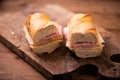 Baguette sandwiches on rustic table Royalty Free Stock Photo