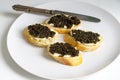 Natural sturgeon black caviar sandwiches, luxury seafood delicacy Royalty Free Stock Photo