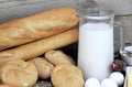 Baguette and various breads and foods on Wall background