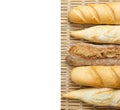 Baguette of whole wheat bread on a white background Royalty Free Stock Photo