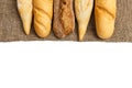 Baguette of whole wheat bread on a white background Royalty Free Stock Photo