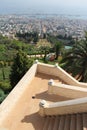 Bahai Gardens at the port of Haifa in Israel with a view of palm trees and harbor in the background Royalty Free Stock Photo