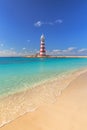 Bahamas Beach with red white Lightouse Royalty Free Stock Photo