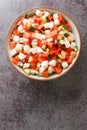 Bahamian Conch Salad taste of the Caribbean with refreshing raw seafood dish closeup on the plate. vertical top view Royalty Free Stock Photo