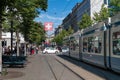 Bahnhofstrasse in Zurich whit tram andSwiss flag Royalty Free Stock Photo