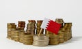 Bahrain flag with stack of money coins Royalty Free Stock Photo