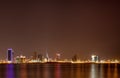 Bahrain skyline illuminated at night Royalty Free Stock Photo