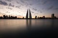 Bahrain skyline during sunrise. A long exposure image showing the streaks of clouds