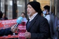 A Bahraini activist conducts a media interview during a protest outside Formula 1Ã¢â¬â¢s offices in London, UK on March 18, 2022,