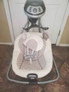 Bahy Swing Front View Cradle Rocker for Infant Pink Gray Royalty Free Stock Photo