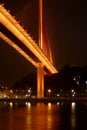 Bai chay bridge in halong bay Vietnam lit up with orange gold lighting