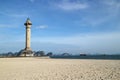 Bai Chay Light house , Cargo Ship on Ha Long bay Quang Ninh province Vietnam