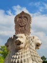 Bai Sema stone with lion column in Thai temple.