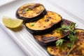 Baigan fry also known as eggplant or brinjal fry Royalty Free Stock Photo