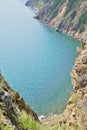 Baikal Costline, Olkhon island. Panoramic view of the Baikal coastline, with vertical rocky cliffs.