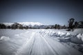 Baikal. Holy Nose Peninsula. Barguzinsky Gulf Coast in the winter. The road in the snow. Tinted. Royalty Free Stock Photo