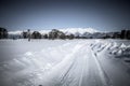 Baikal. Holy Nose Peninsula. Barguzinsky Gulf Coast in the winter. The road in the snow. Tinted. Royalty Free Stock Photo