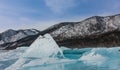 Baikal hummocks. Turquoise triangular ice floes stand upright