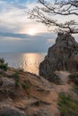 Lake Baikal in evening time. View of the sacred cape Burkhan and Shamanka rock