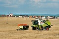 Baikivtsi, Ternopil Oblast, UKRAINE - August 10, 2020: completion of the grain harvesting process in the field, the sickle trailer