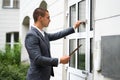 Bailiff Debt Collector Man Knocking Door Royalty Free Stock Photo