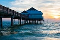 Store and Pier on beach Royalty Free Stock Photo