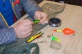 Bait, wobbler and fishing accessories on the table Royalty Free Stock Photo