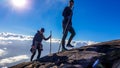 Bajawa - A couple walking above the clouds