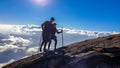 Bajawa - A couple walking above the clouds