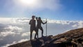 Bajawa - A couple walking above the clouds