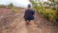 Bajawa - A girl going down the volcano Inierie