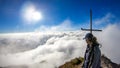 Bajawa - Girl standing on top of a volcano, surrounded by clouds Royalty Free Stock Photo