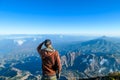 Bajawa - A man standing on the top of the volcano, admiring the view Royalty Free Stock Photo