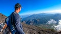 Bajawa - A man taking a selfie while going down the Inierie Volcano