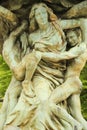 Bajnotti Fountain, statue in Providence, RI.. winged female angel in the grip of earthbound male figures