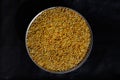 bajra grain on steel bowl,millet Grain bajri on black background,healthy millet grain