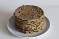 Bajra methi thepla. Indian flat bread made of pearl millet flour, fenugreek leaves, sesame seeds, yogurt and spices Royalty Free Stock Photo