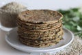 Bajra methi thepla. Indian flat bread made of pearl millet flour, fenugreek leaves, sesame seeds, yogurt and spices Royalty Free Stock Photo