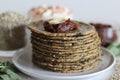 Bajra methi thepla. Indian flat bread made of pearl millet flour, fenugreek leaves, sesame seeds, yogurt and spices. Served with Royalty Free Stock Photo