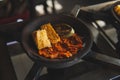 Bakaran or the process of grilling tahu tempe with sambal chili sauce Royalty Free Stock Photo
