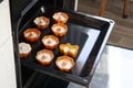 Bake cupcakes in silicone molds in the oven. Cooking at home Royalty Free Stock Photo
