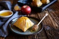 Baked apple dumplings with honey Royalty Free Stock Photo