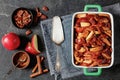 Baked Apple French Toast topped with pecan nuts Royalty Free Stock Photo