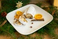 Baked apple stollen on white plate