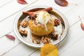 Baked apples with ice cream and oatmeal,healthy fruit dessert Royalty Free Stock Photo