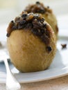 Baked Apples stuffed with Christmas Pudding Royalty Free Stock Photo