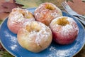 Baked apples with sugar, autumn dish, dessert Royalty Free Stock Photo