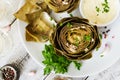 Baked artichokes cooked with garlic sauce